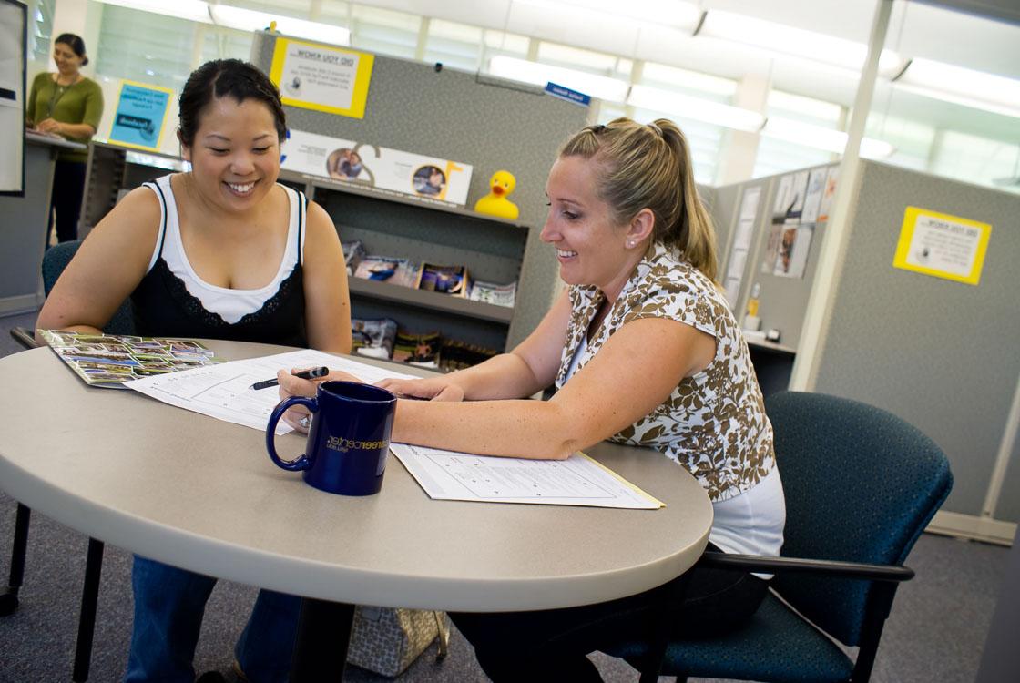 two students sitting at a desk